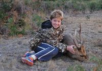 13 year old Dean 2015 with his Hoggy, 120 meter shot in the neck